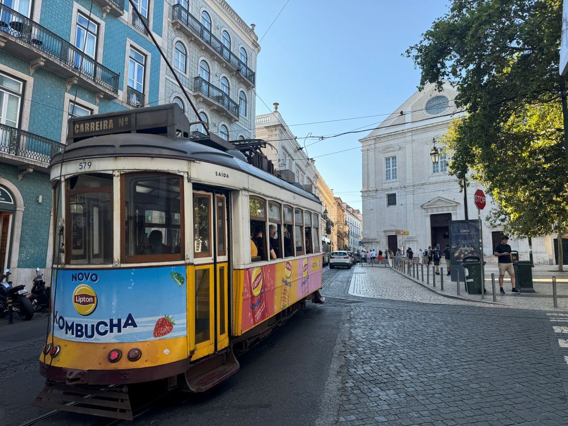 Yellow tram on the streets of Lisbon, Portugal
