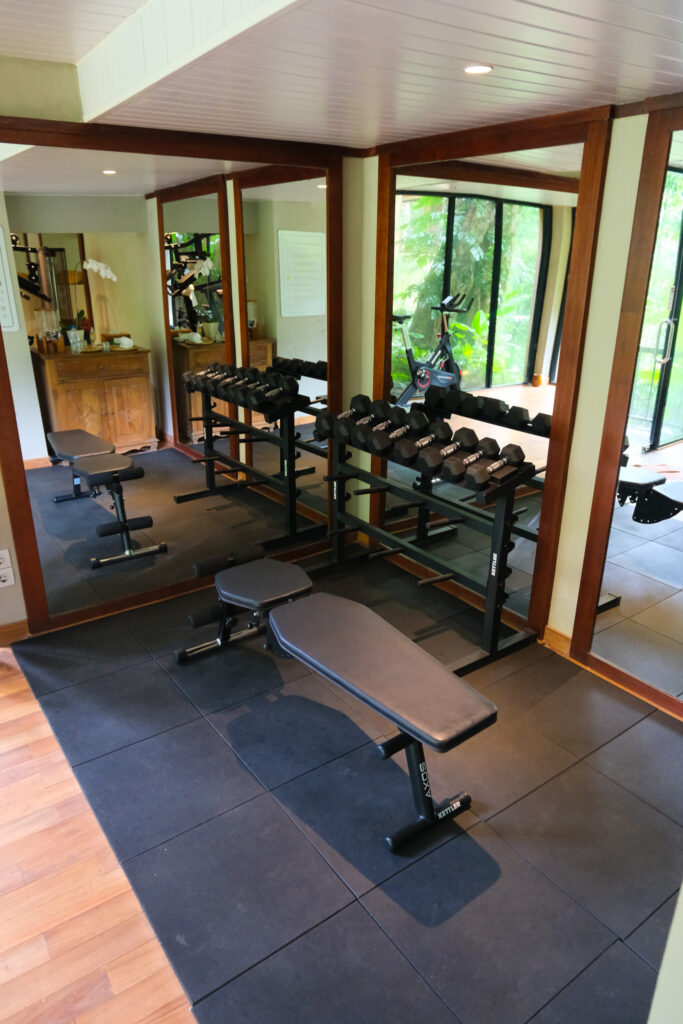 Gym bench and dumbbells at Akohara Buahan Village Retreat Ubud Bali