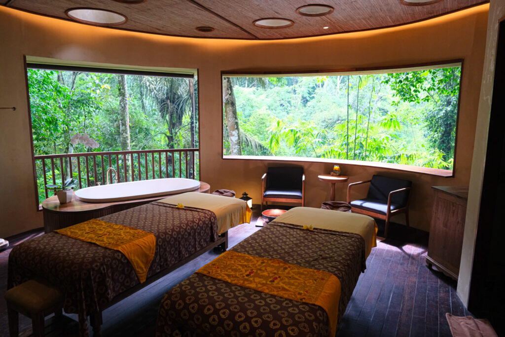 Hara Wellness Spa open-air treatment room overlooking jungle Akohara Buahan Bali