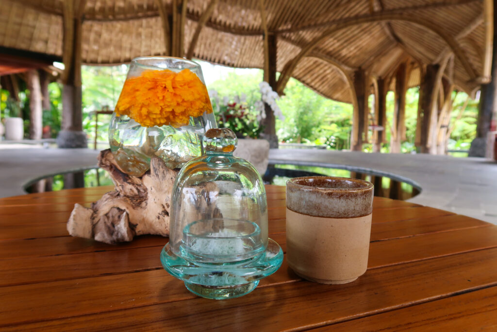 Jamu traditional drink welcome at Akohara Buahan Village Retreat Ubud Bali
