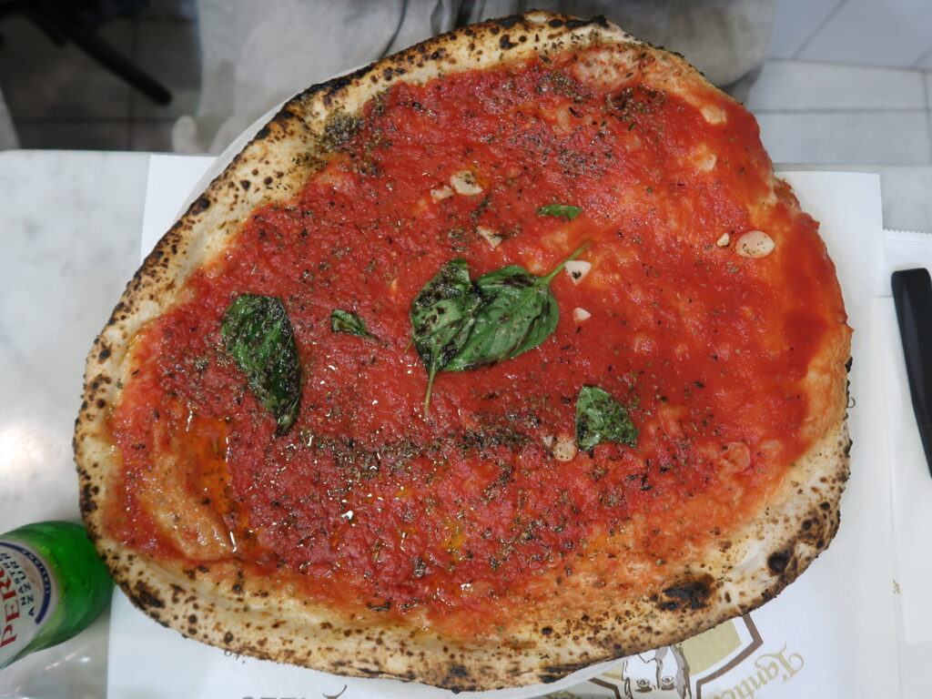 Marinara pizza with garlic and oregano at Da Michele Naples