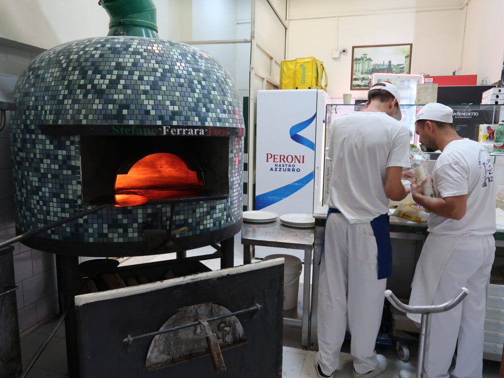 Chefs in the kitchen at L'Antica Pizzeria da Michele in Naples