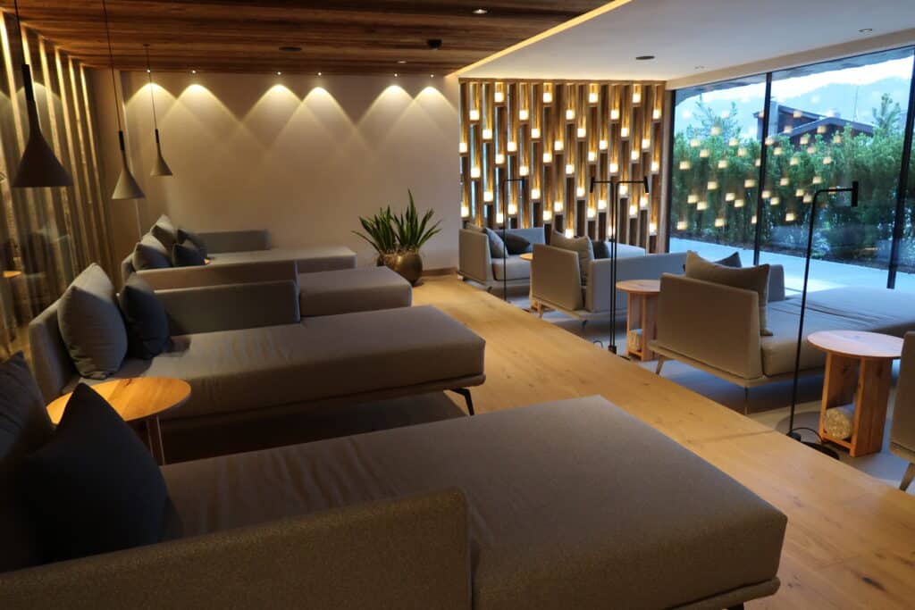 Indoor sunlounges and wellness area at Hotel Recort in Italy