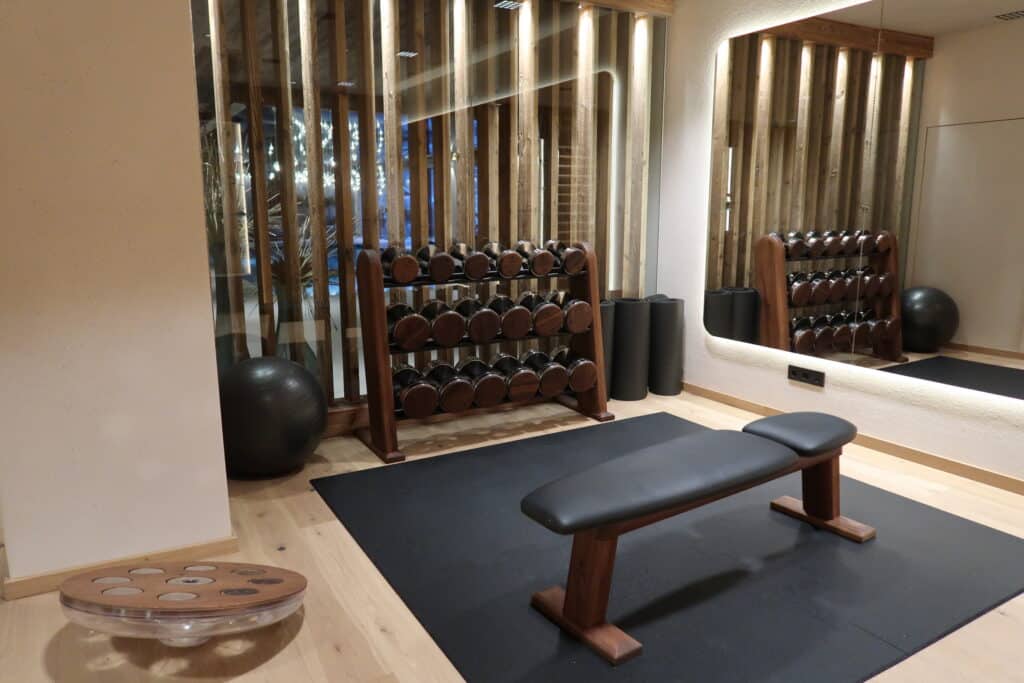Gym bench and dumbbells at Hotel Recort in Italy