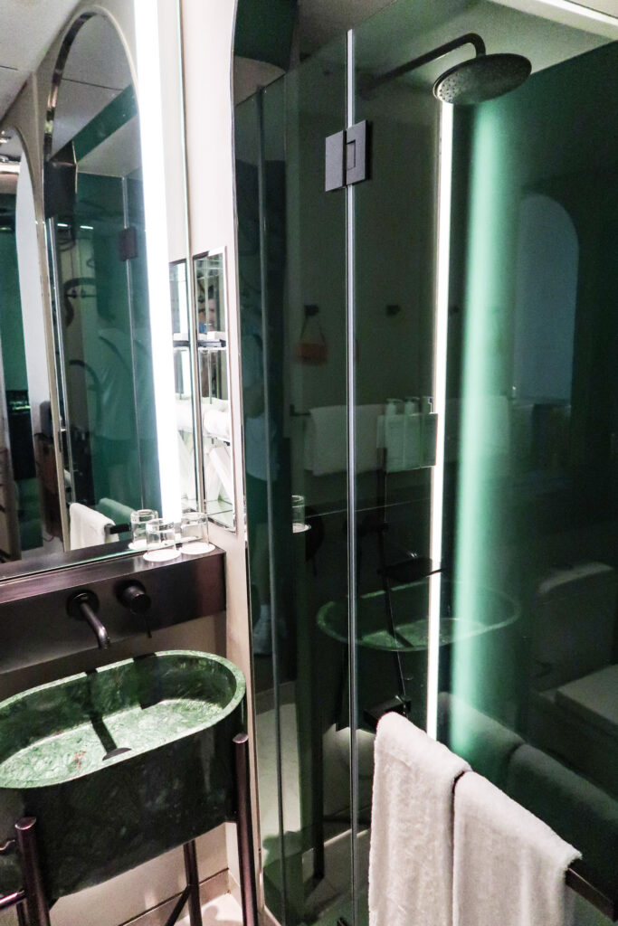 Emerald green bathroom at the Mondrian Singapore Duxton hotel