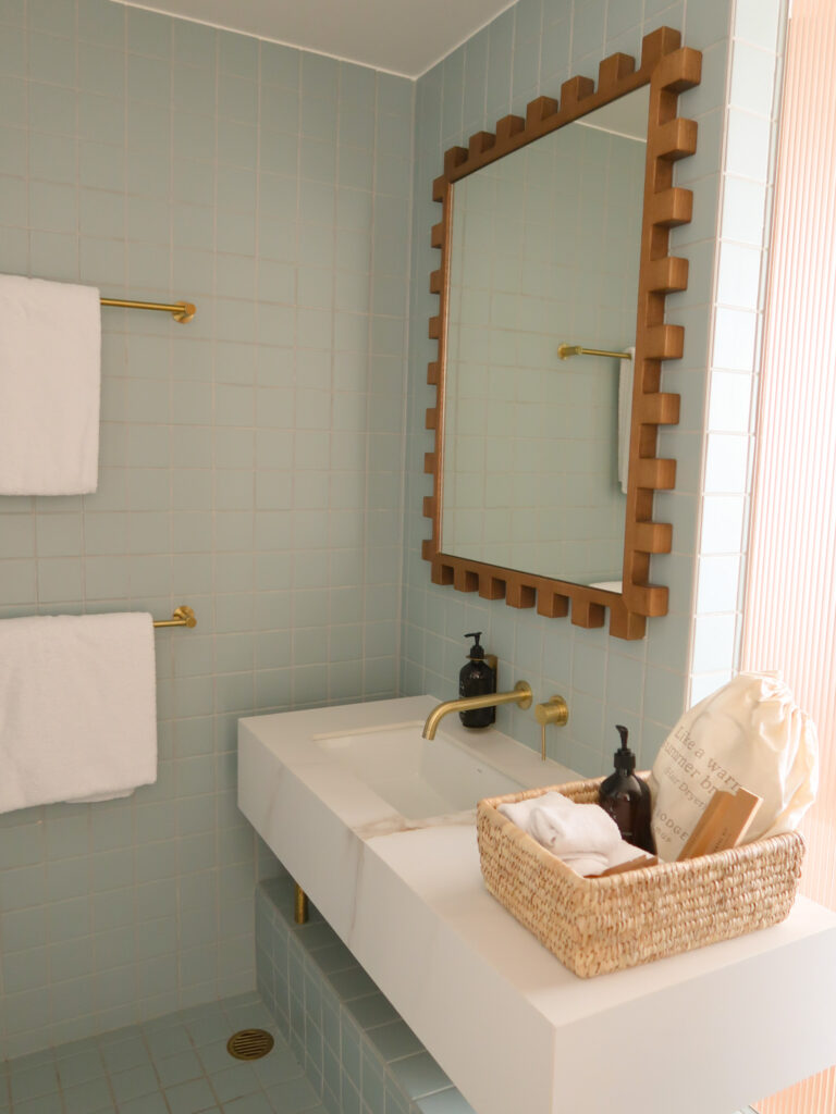 Bathroom sink and mirror at The Lodge Wadjemup